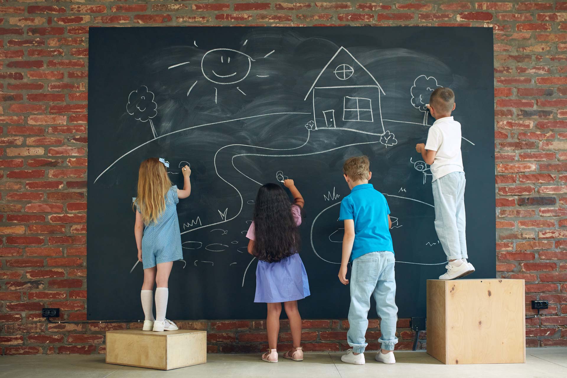 children at chalk board